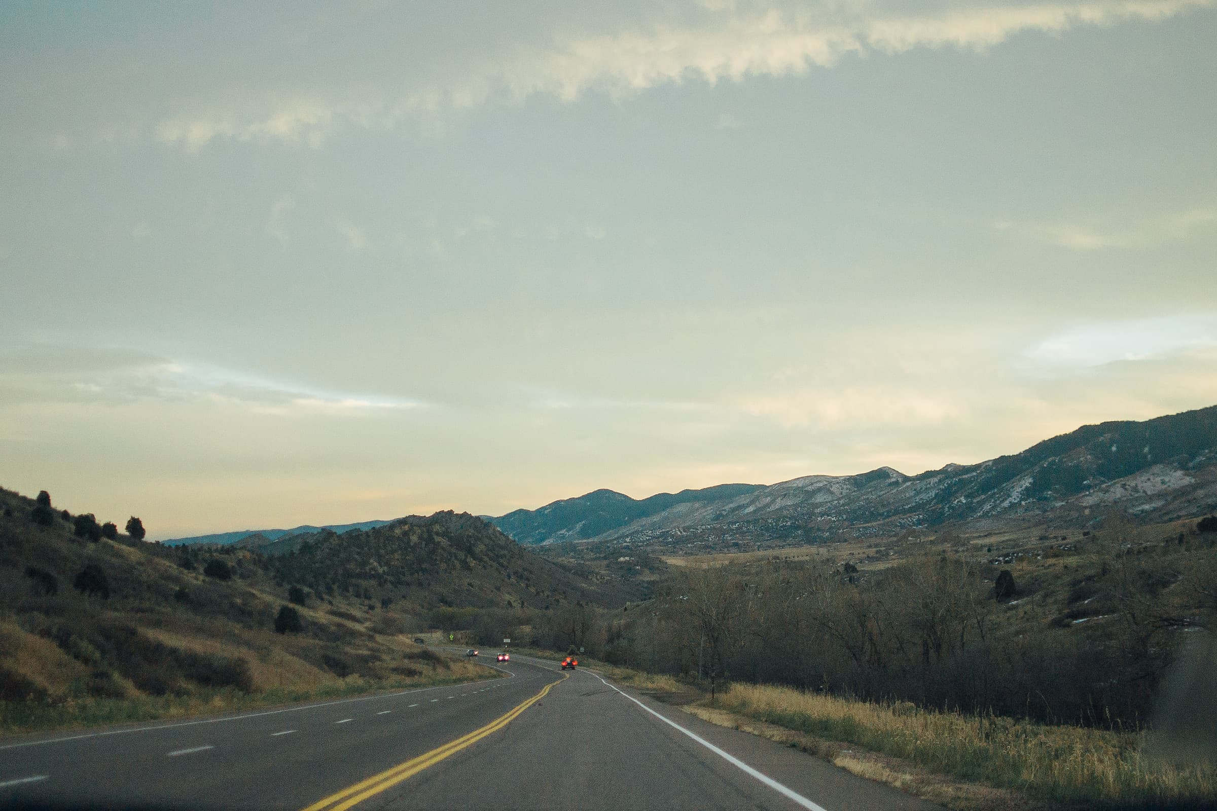 Landscape of an open road and mountain range